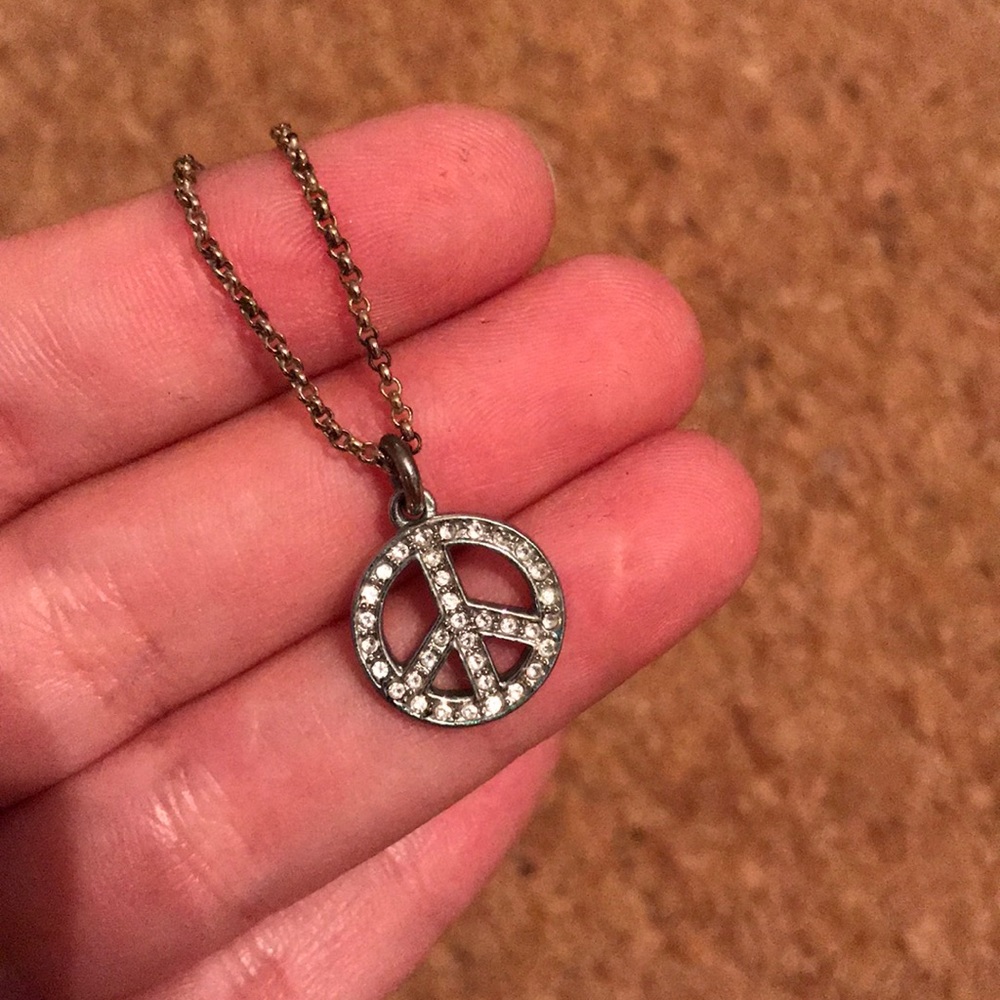 Juicy Couture peace sign necklace